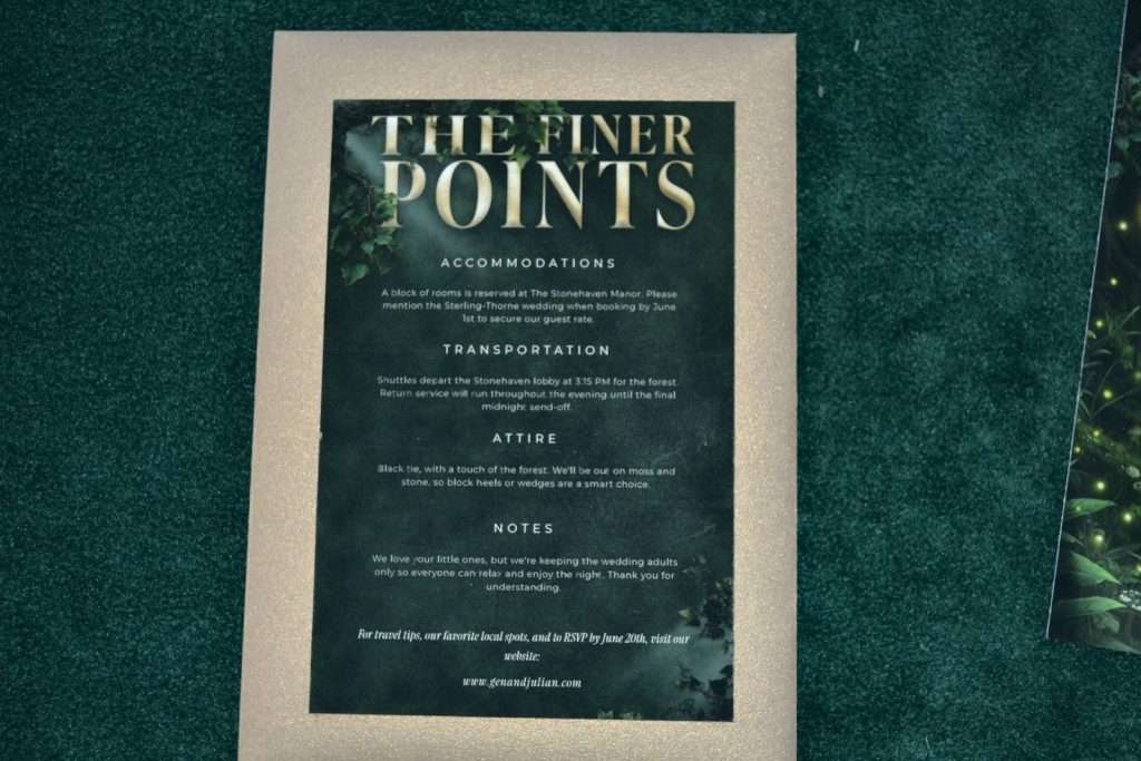 Enchanted Forest details card on a gold mat with dark green velvet